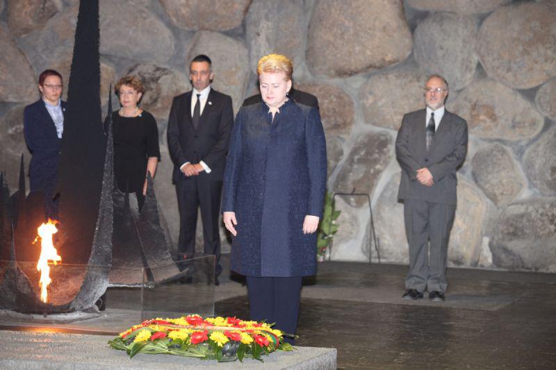 Lithuania President Dalia Grybauskaite (right) lays a wreath in the Hall of Remembrance.
